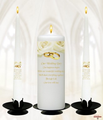 Rose and Gold Rings on White Candles